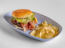 Chev's Cafe burger served with chips